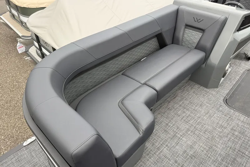 Slide: The Image of Luxurious seating on Whisper VISION RLS 23V boat, 2027 model, with elegant gray upholstery. - 14