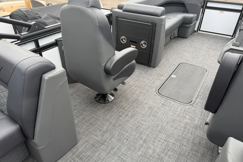 Slide: The Image of Luxurious interior of 2027 Whisper VISION RLS 23V boat with gray seating and flooring. - 19