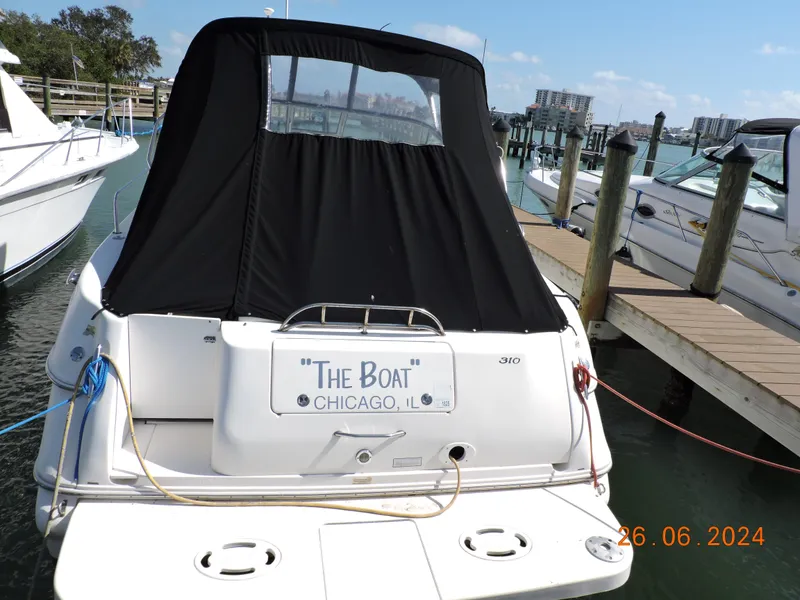 Slide: The Image of 2002 Sea Ray 310 Sundancer docked in Chicago marina. - 1