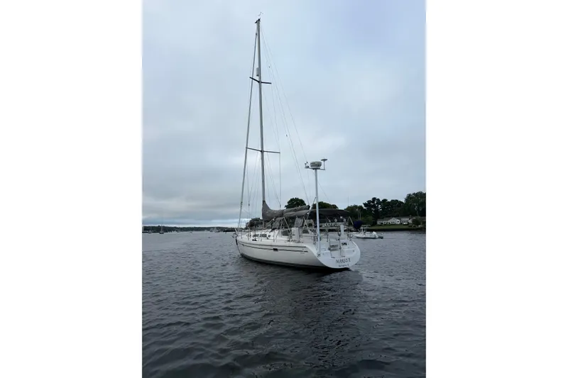 Slide: The Image of Sailboat Catalina 380, 1998 model, anchored on a calm, overcast day. - 3
