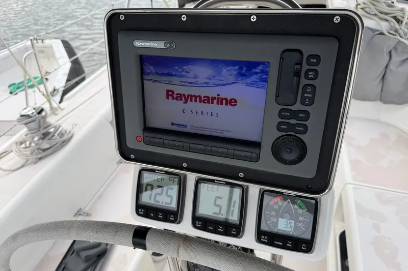 Slide: The Image of Raymarine navigation system on 1998 Catalina 380 sailboat, displaying C Series interface. - 32