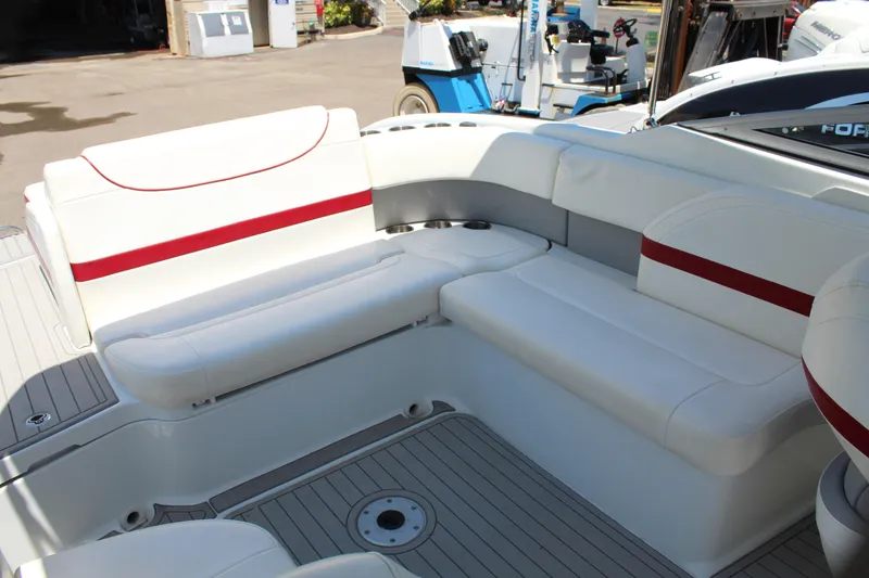 Slide: The Image of 2011 Formula 270 Bowrider boat interior with white and red seating. - 37