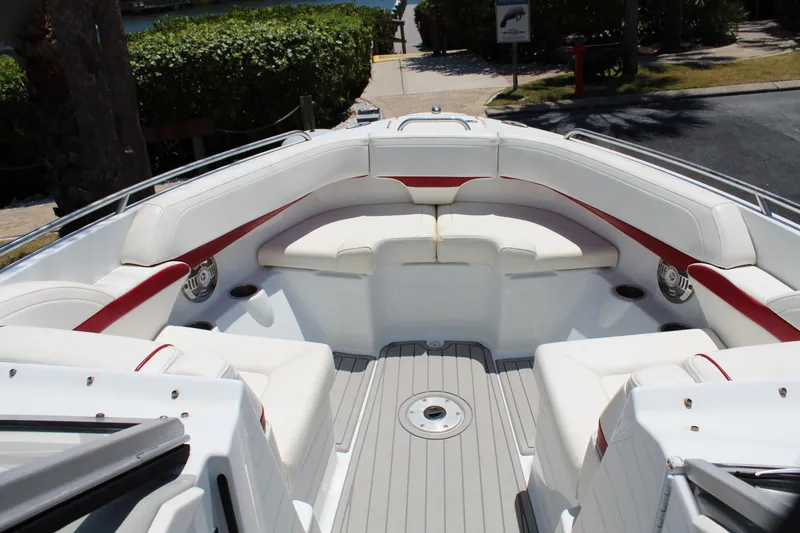 Slide: The Image of 2011 Formula 270 Bowrider boat interior with white and red seating. - 41
