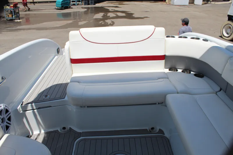 Slide: The Image of 2011 Formula 270 Bowrider boat interior with white and red seating. - 35