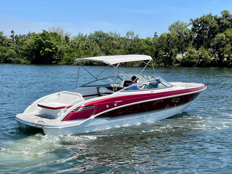 Slide: The Image of 2011 Formula 270 Bowrider cruising on a scenic lake. - 9