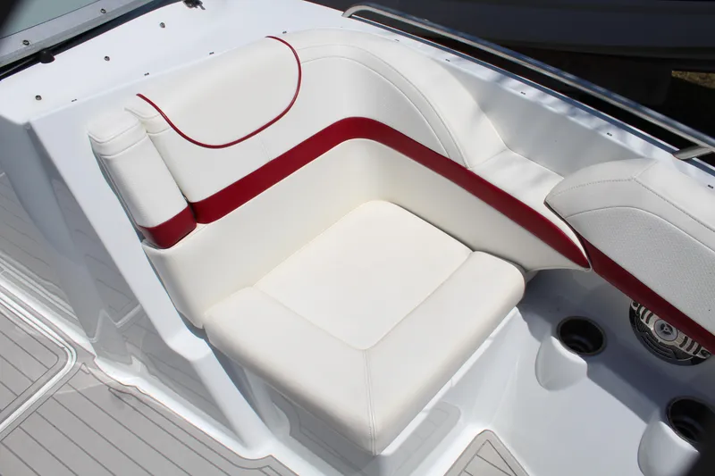 Slide: The Image of 2011 Formula 270 Bowrider white and red cushioned seating area. - 42