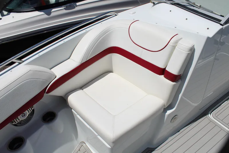 Slide: The Image of 2011 Formula 270 Bowrider white and red cushioned seating area. - 43