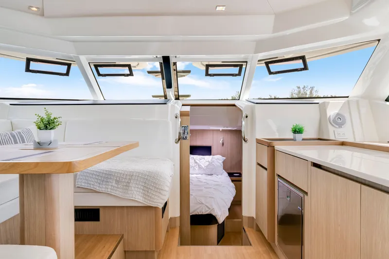 Slide: The Image of Interior of 2019 Aquila 44 Yacht featuring modern design and cozy cabin. - 50