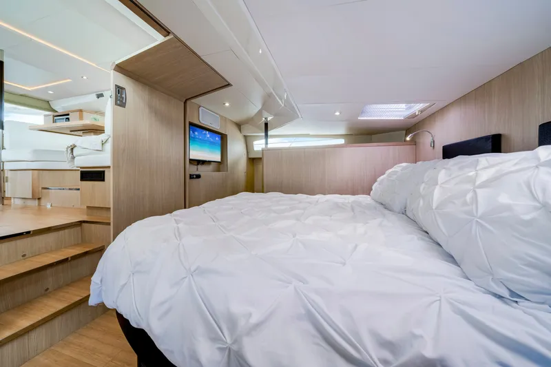 Slide: The Image of Luxurious interior of 2019 Aquila 44 Yacht featuring a cozy bedroom and modern amenities. - 52