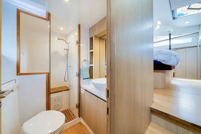 Slide: The Image of Luxurious bathroom and bedroom interior of 2019 Aquila 44 Yacht, featuring modern design and amenities. - 56
