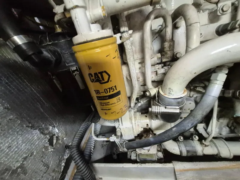 Slide: The Image of Engine compartment of a 2002 Silverton 38 Convertible with CAT fuel filter. - 42