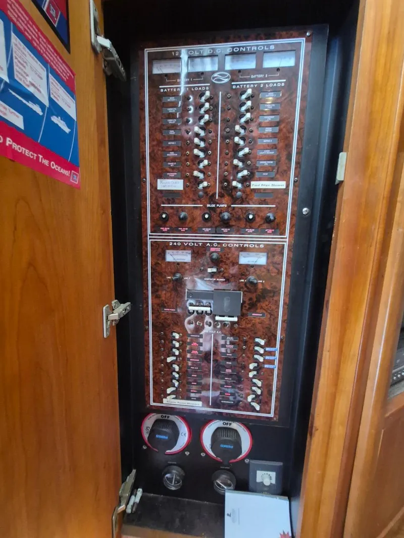 Slide: The Image of Electrical control panel on a 2002 Silverton 38 Convertible boat. - 25