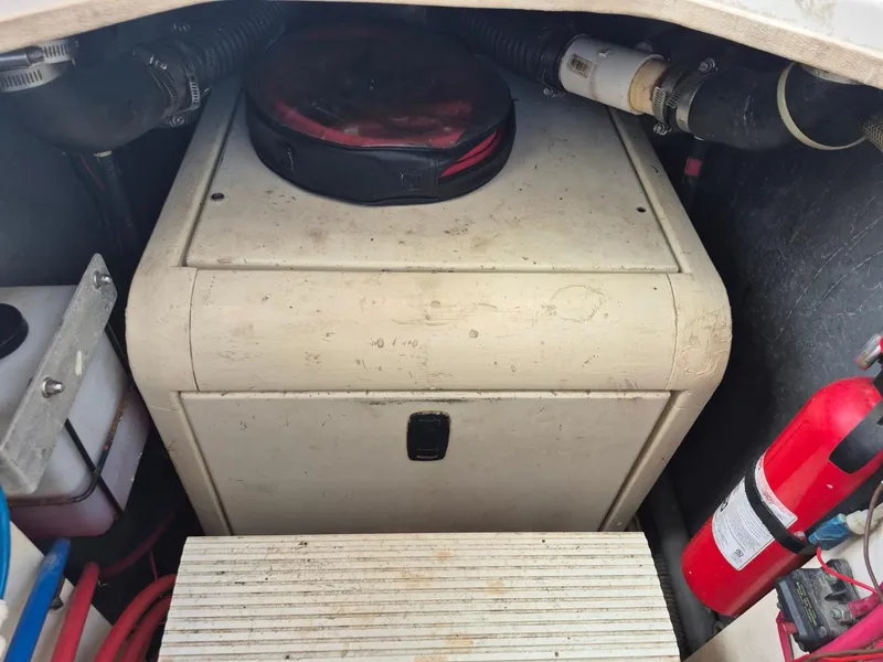 Slide: The Image of Engine compartment of 2002 Silverton 38 Convertible with fire extinguisher and equipment. - 20