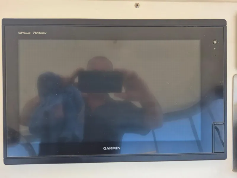 Slide: The Image of Garmin GPSmap 7616xsv display on 2002 Silverton 38 Convertible boat dashboard. - 11