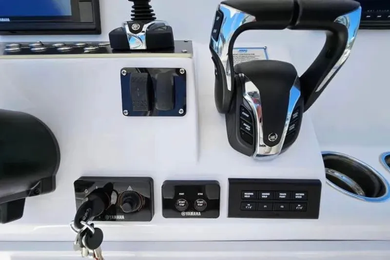 Slide: The Image of Control panel of 2022 Century 2900 Center Console boat with Yamaha throttle and switches. - 6