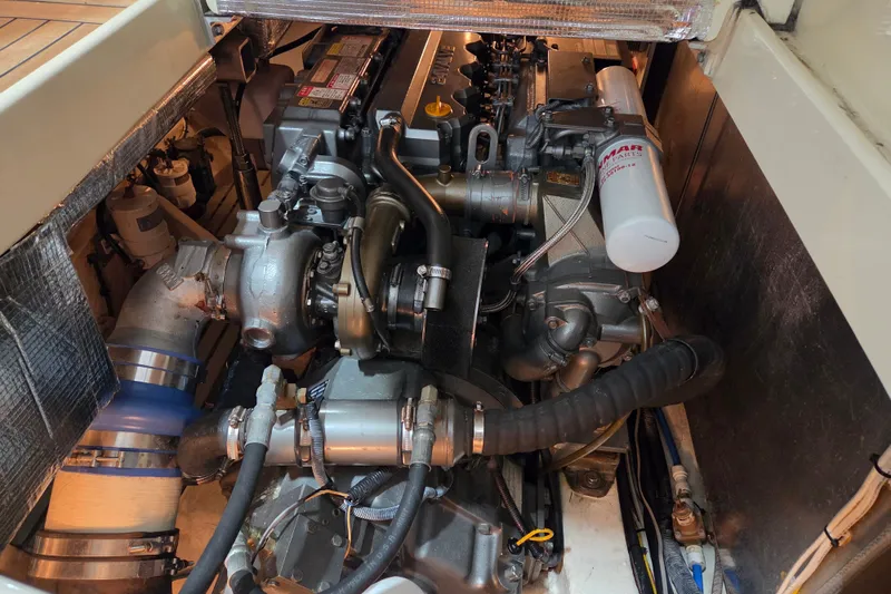 Slide: The Image of Engine compartment of a 2009 Hinckley Talaria 44, showcasing detailed mechanical components. - 18