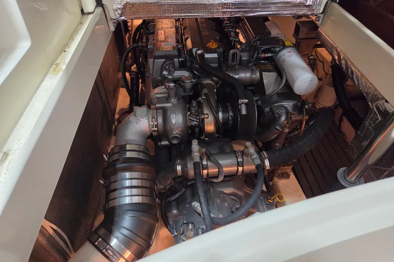 Slide: The Image of Engine compartment of a 2009 Hinckley Talaria 44 yacht, showcasing mechanical components. - 17