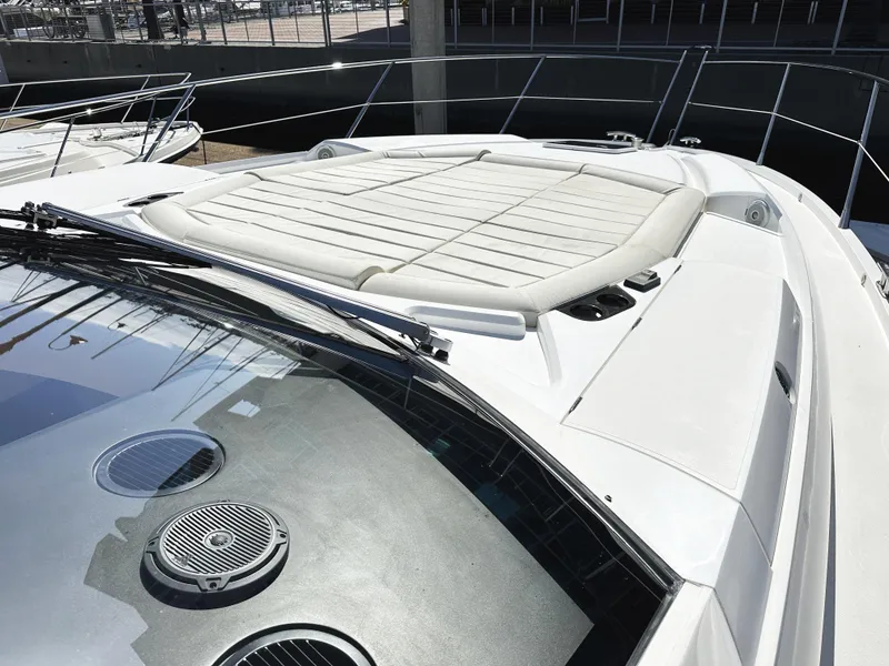 Slide: The Image of 2015 Sunseeker Predator 57 yacht with sunpad and sleek design. - 42