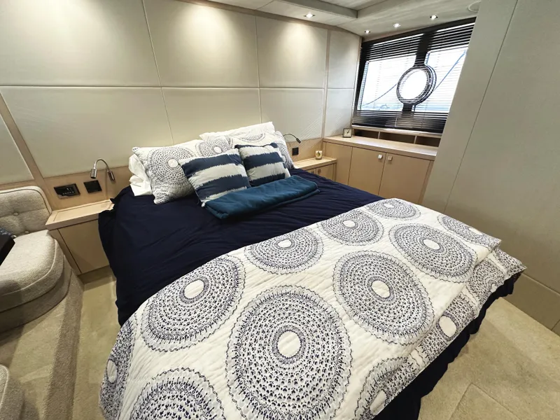 Slide: The Image of Luxurious bedroom interior of 2015 Sunseeker Predator 57 yacht with elegant bedding and decor. - 37