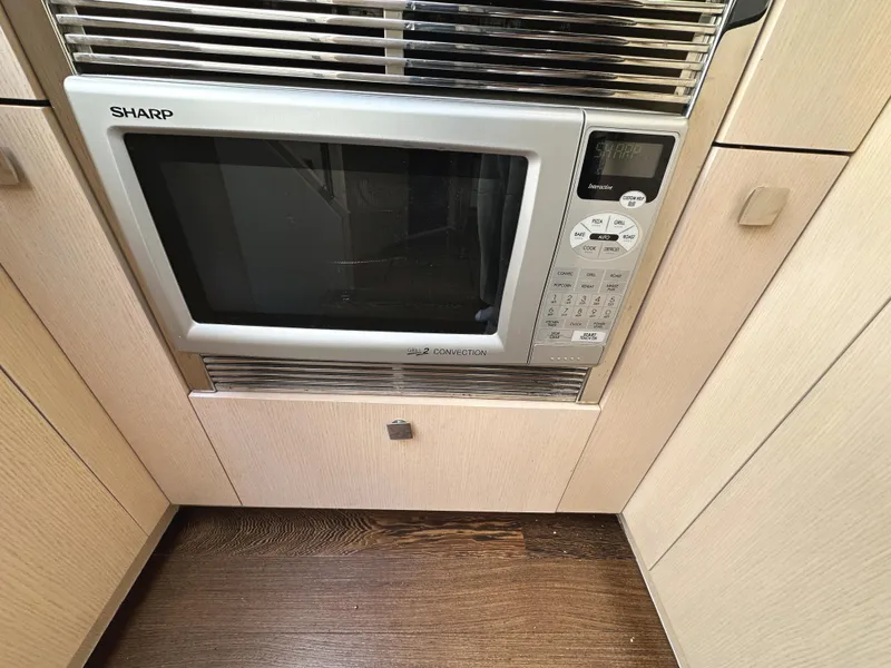 Slide: The Image of Built-in Sharp microwave in Sunseeker Predator 57 yacht kitchen, 2015 model. - 27