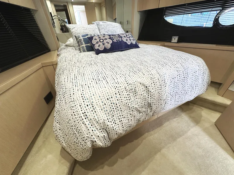 Slide: The Image of Luxurious bedroom interior of 2015 Sunseeker Predator 57 yacht with elegant bedding. - 33