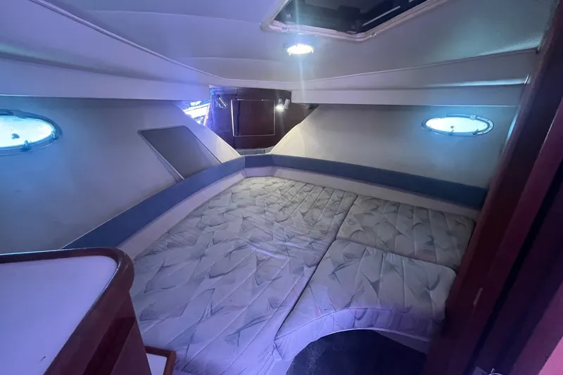 Slide: The Image of Interior cabin of 1992 Carver 33 Aft Cabin Motor Yacht with cozy bedding. - 29