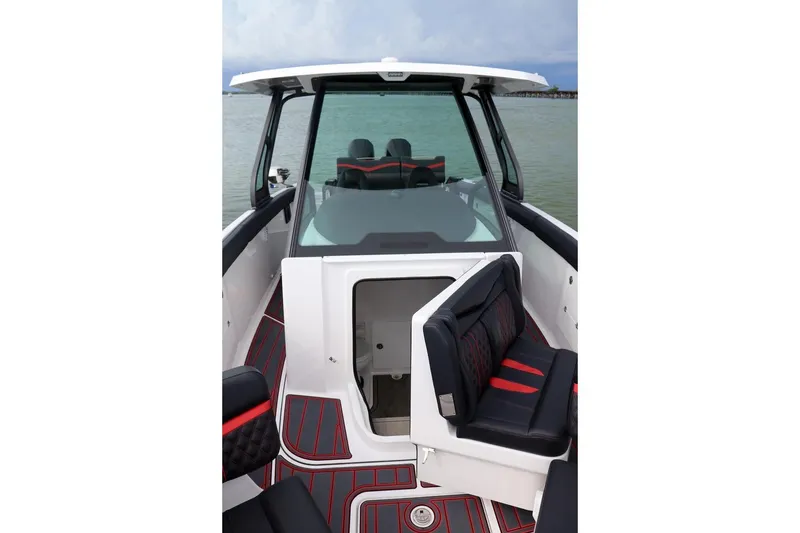 Slide: The Image of 2027 Monterey Elite 30 OB boat interior with modern seating and sleek design. - 5