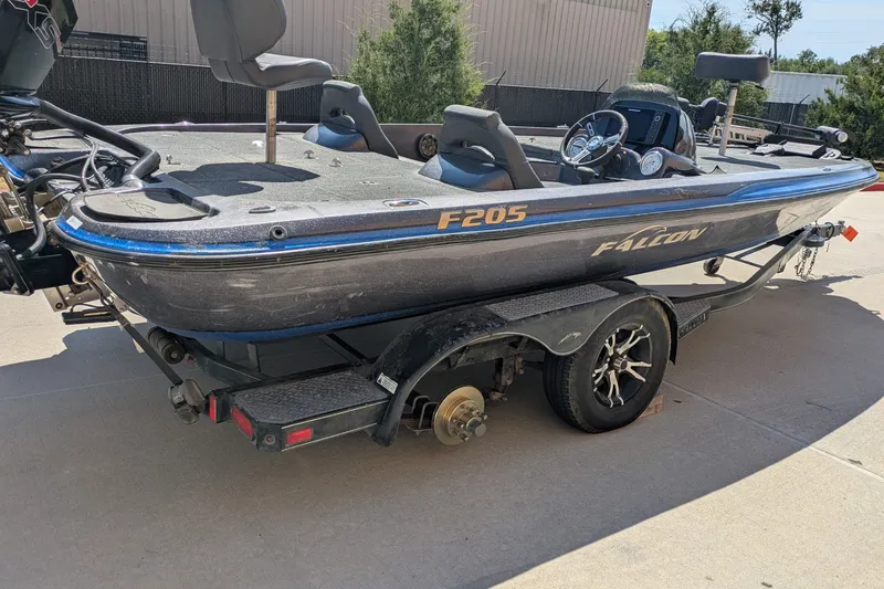 The Image of 2018 Falcon F205 boat on trailer, parked outdoors in sunlight. - 0