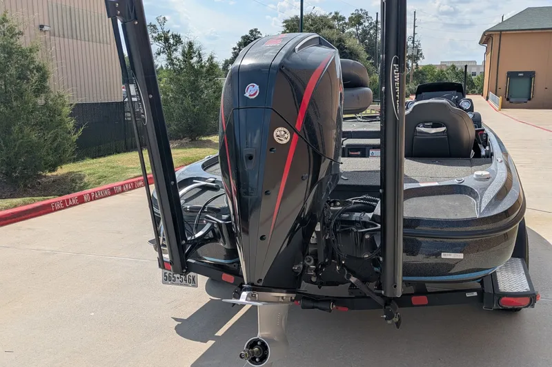 Slide: The Image of 2019 Nitro Z18 boat with powerful outboard motor, parked on a sunny day. - 10