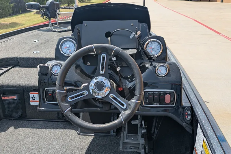 Slide: The Image of Steering console of a 2019 Nitro Z18 boat with gauges and controls. - 9