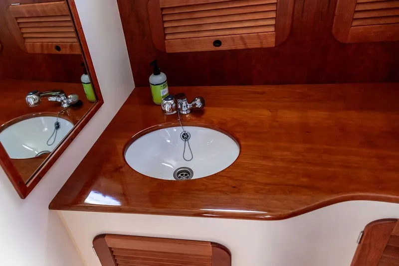 Slide: The Image of Elegant wooden vanity with sink in 2017 Hinckley Picnic Boat 37 MKIII. - 16