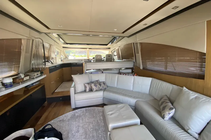 Slide: The Image of Luxurious interior of 2018 Sea Ray L590 yacht with modern furnishings and spacious layout. - 10