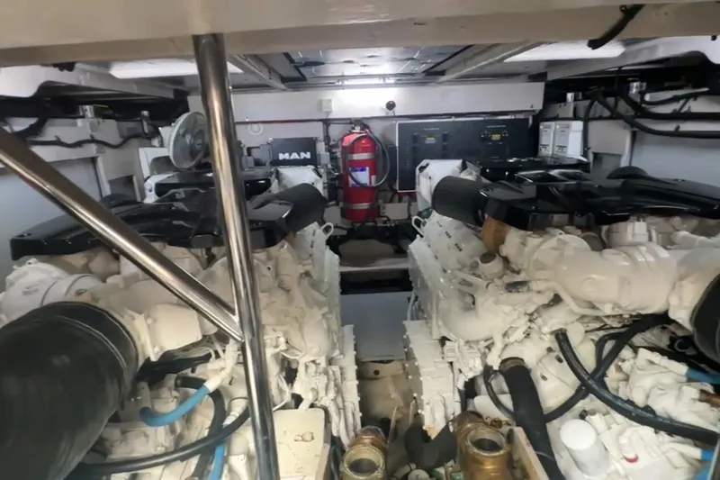 Slide: The Image of Engine room of a 2018 Sea Ray L590 yacht with dual MAN engines. - 8