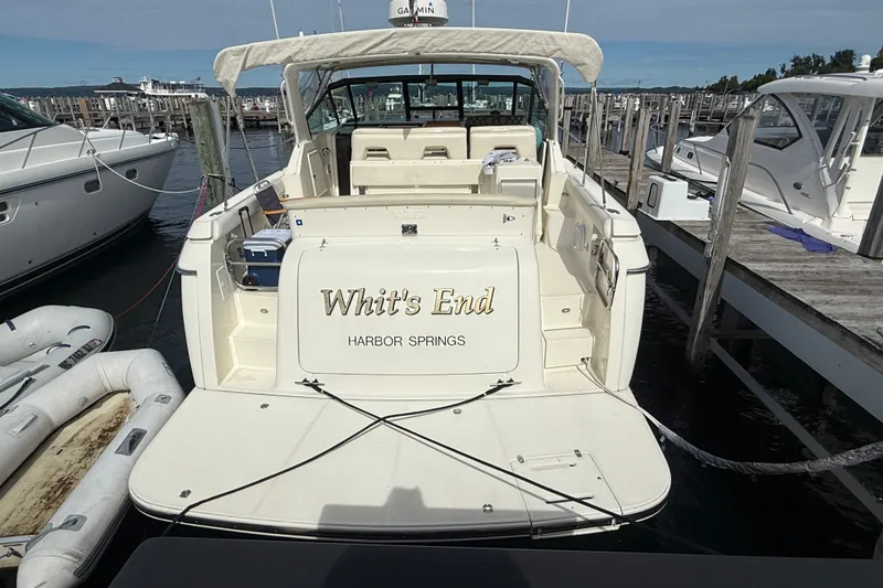 Slide: The Image of 1997 Tiara 3500 EXPRESS yacht named "Whit’s End" docked at Harbor Springs marina. - 32