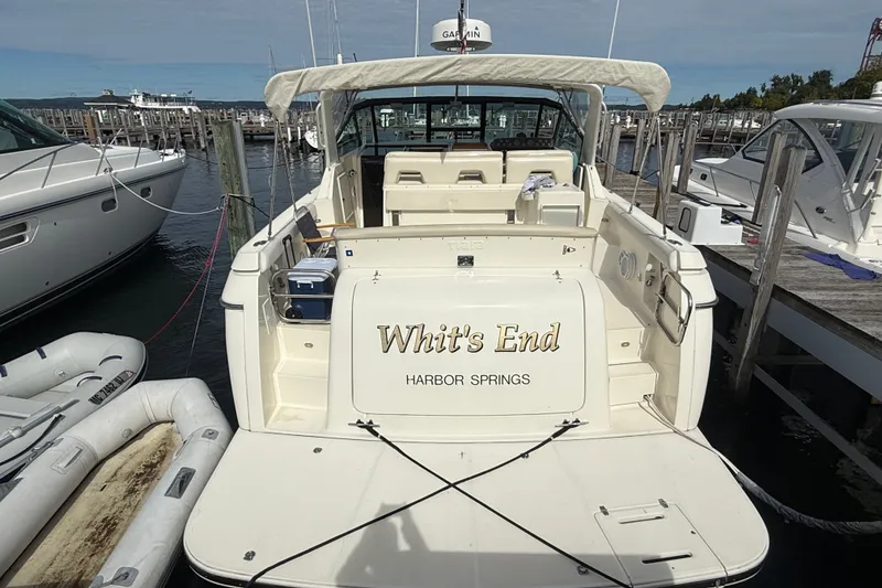 Slide: The Image of 1997 Tiara 3500 EXPRESS boat docked, named "Whit’s End," in Harbor Springs marina. - 33