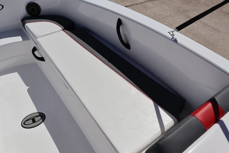 Slide: The Image of 2027 Tahoe T18 boat interior with white seating and red accents. - 11