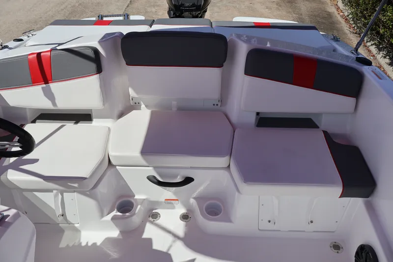 Slide: The Image of Interior seating of 2027 Tahoe T18 boat with red and gray accents. - 13