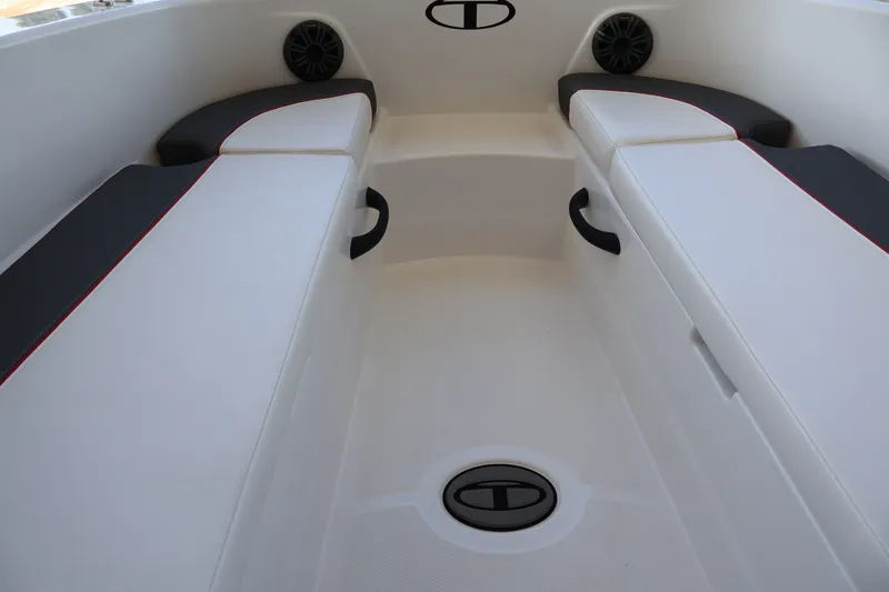 Slide: The Image of Interior of 2027 Tahoe T18 boat with white seating and black accents. - 21