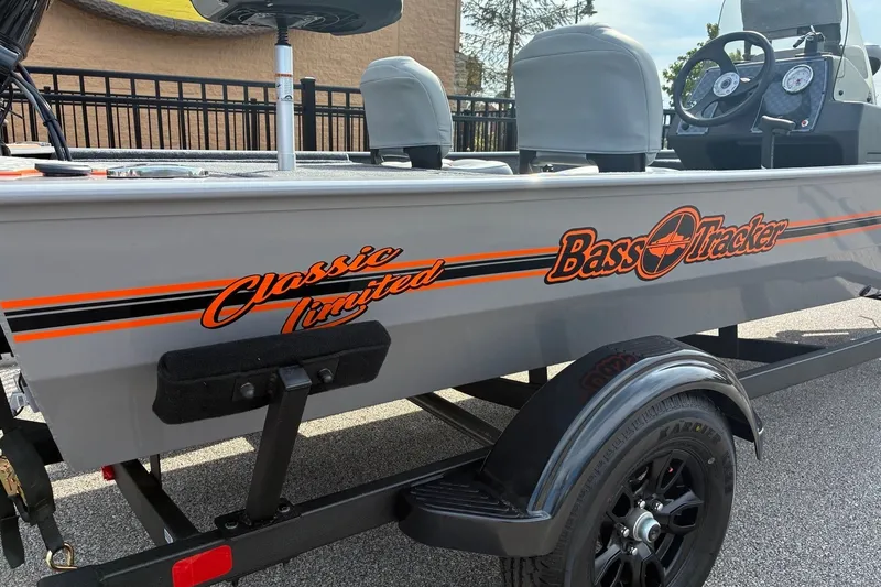 The Image of 2027 Tracker Bass Tracker Classic Limited boat with sleek design and vibrant graphics. - 0