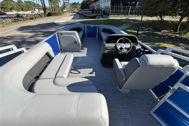 Slide: The Image of 2027 Sun Tracker Party Barge 18 DLX pontoon boat with spacious seating and modern helm. - 22