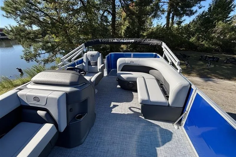 Slide: The Image of 2027 Sun Tracker Party Barge 18 DLX pontoon boat with spacious seating and modern design. - 18