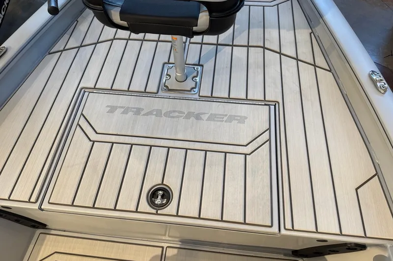 Slide: The Image of 2027 Tracker Bass Tracker 175 CC boat deck with seat and logo. - 14