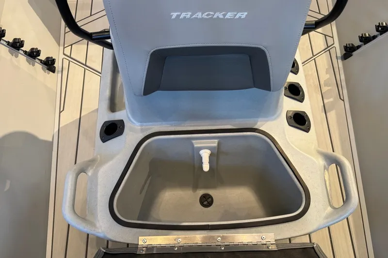 Slide: The Image of 2027 Tracker Bass Tracker 175 CC boat interior with storage compartment and seating. - 17