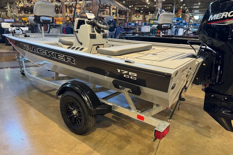 Slide: The Image of 2027 Tracker Bass Tracker 175 CC boat on display in showroom. - 21