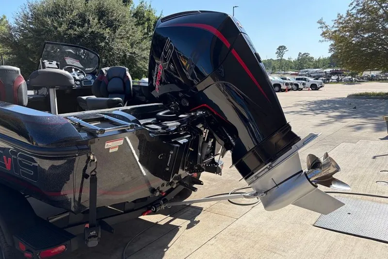 Slide: The Image of 2027 Nitro ZV19 Pro boat with powerful outboard motor, parked outdoors. - 20