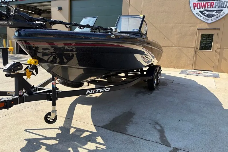 Slide: The Image of 2027 Nitro ZV19 Pro boat on trailer at service center. - 3
