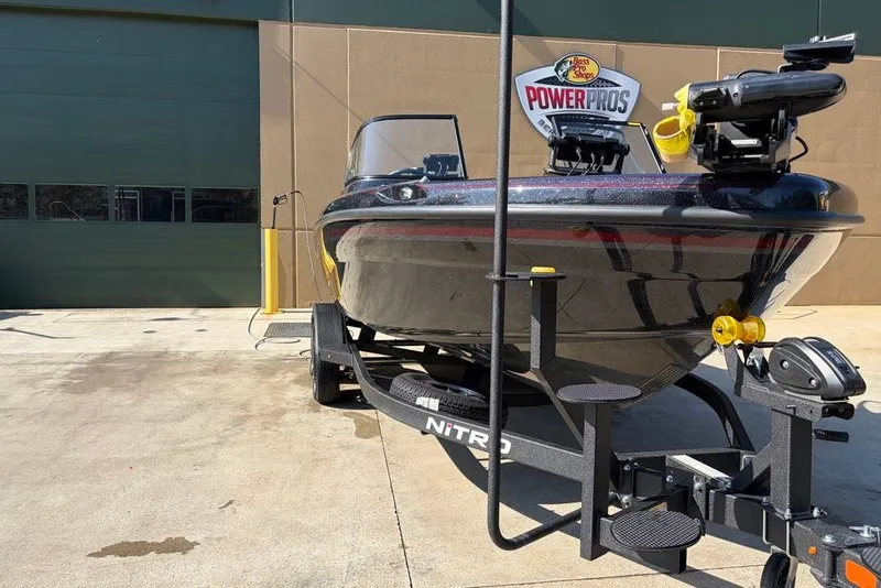 Slide: The Image of 2027 Nitro ZV19 Pro boat on trailer outside Power Pros shop. - 12