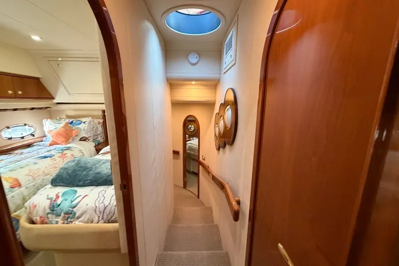 Slide: The Image of Luxurious interior of 2004 Neptunus 56 Flybridge yacht with cozy bedroom and elegant hallway. - 51
