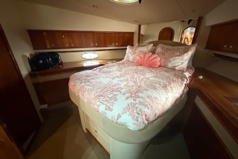 Slide: The Image of Luxurious bedroom interior of 2004 Neptunus 56 Flybridge yacht with elegant bedding. - 47