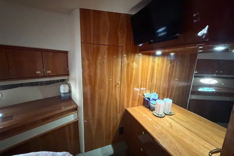 Slide: The Image of Luxurious wood interior of 2004 Neptunus 56 Flybridge yacht cabin with TV and decor. - 46